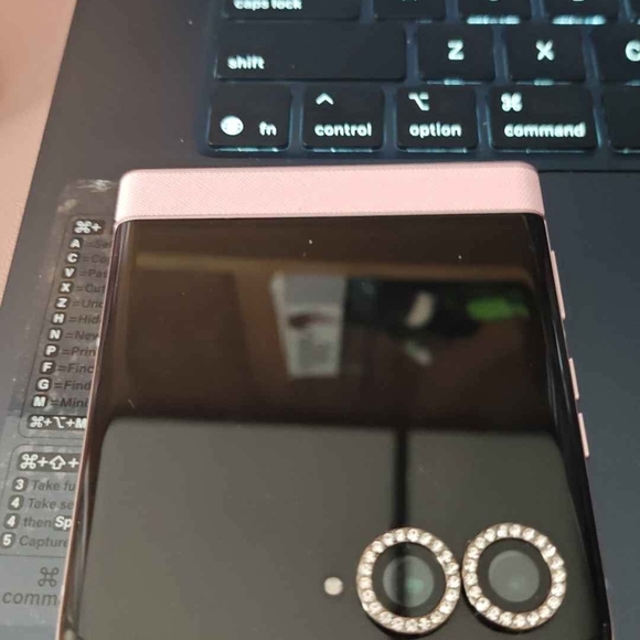 Motorola Black and Pink Smartphone - Picture 1 of 1